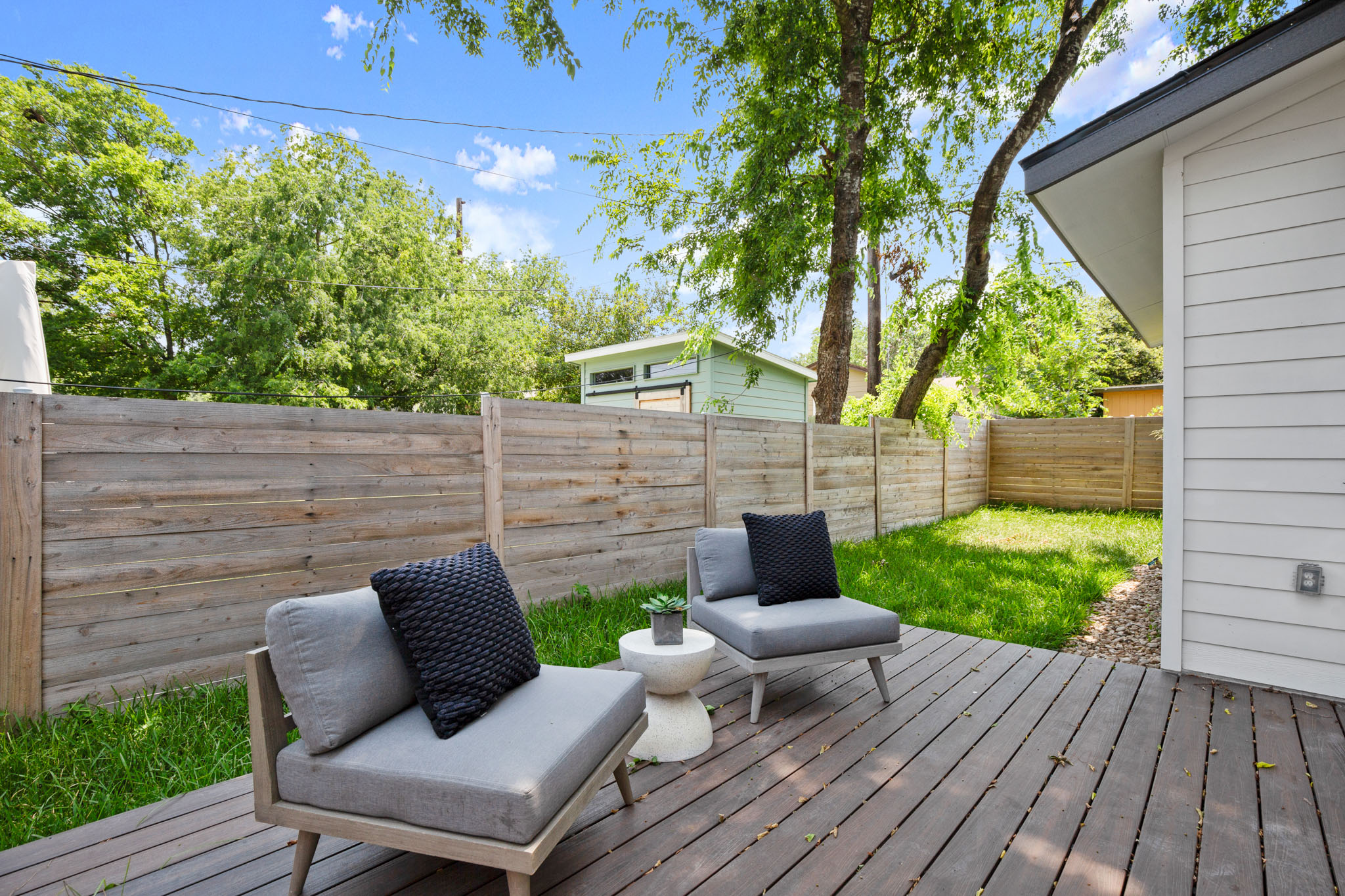 3003 Ray Wood Drive, Unit 2 Austin, TX 78704 - Photo 19 of 28 Wooden deck featuring a fenced backyard