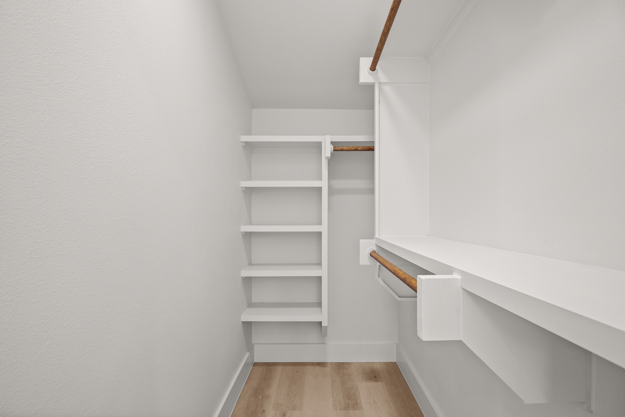 3003 Ray Wood Drive, Unit 2 Austin, TX 78704 - Photo 23 of 28 Walk in closet featuring light wood-style flooring
