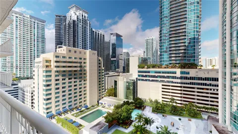 a view of pool with outdoor seating