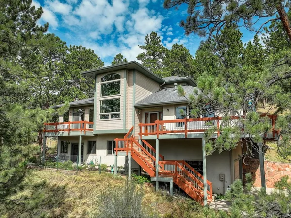 a front view of a house with a porch