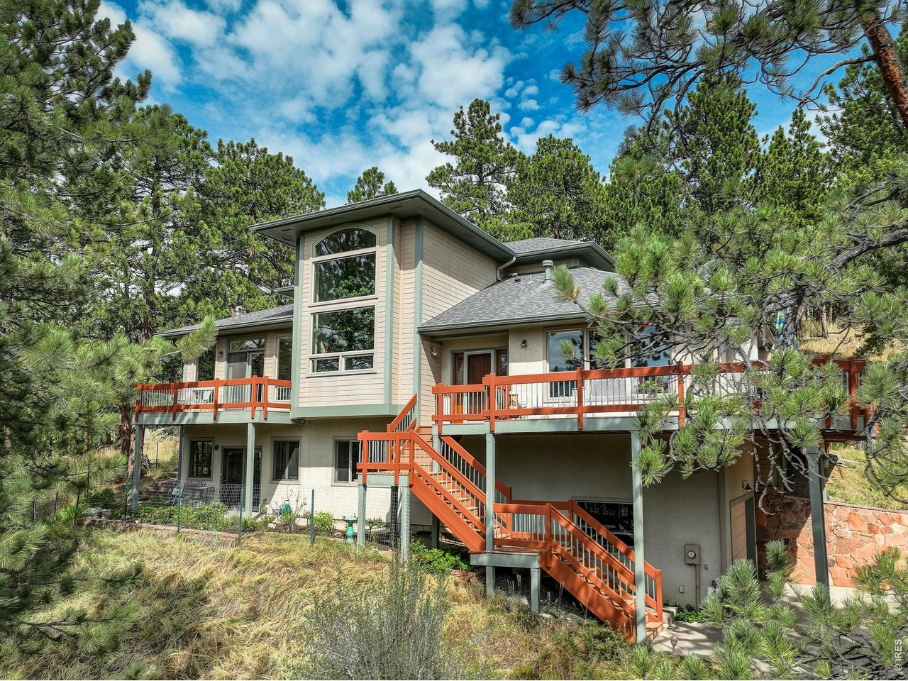 65 Betasso Road Boulder, CO 80302 - Photo 1 of 38 a front view of a house with a porch