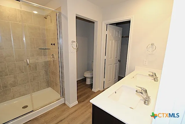 a bathroom with a bathtub and a sink