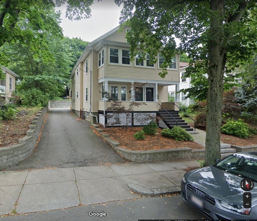 72 Bennett Street, Unit 72 Boston, MA 02135 - Photo 17 of 17 a view of a house with backyard and garden