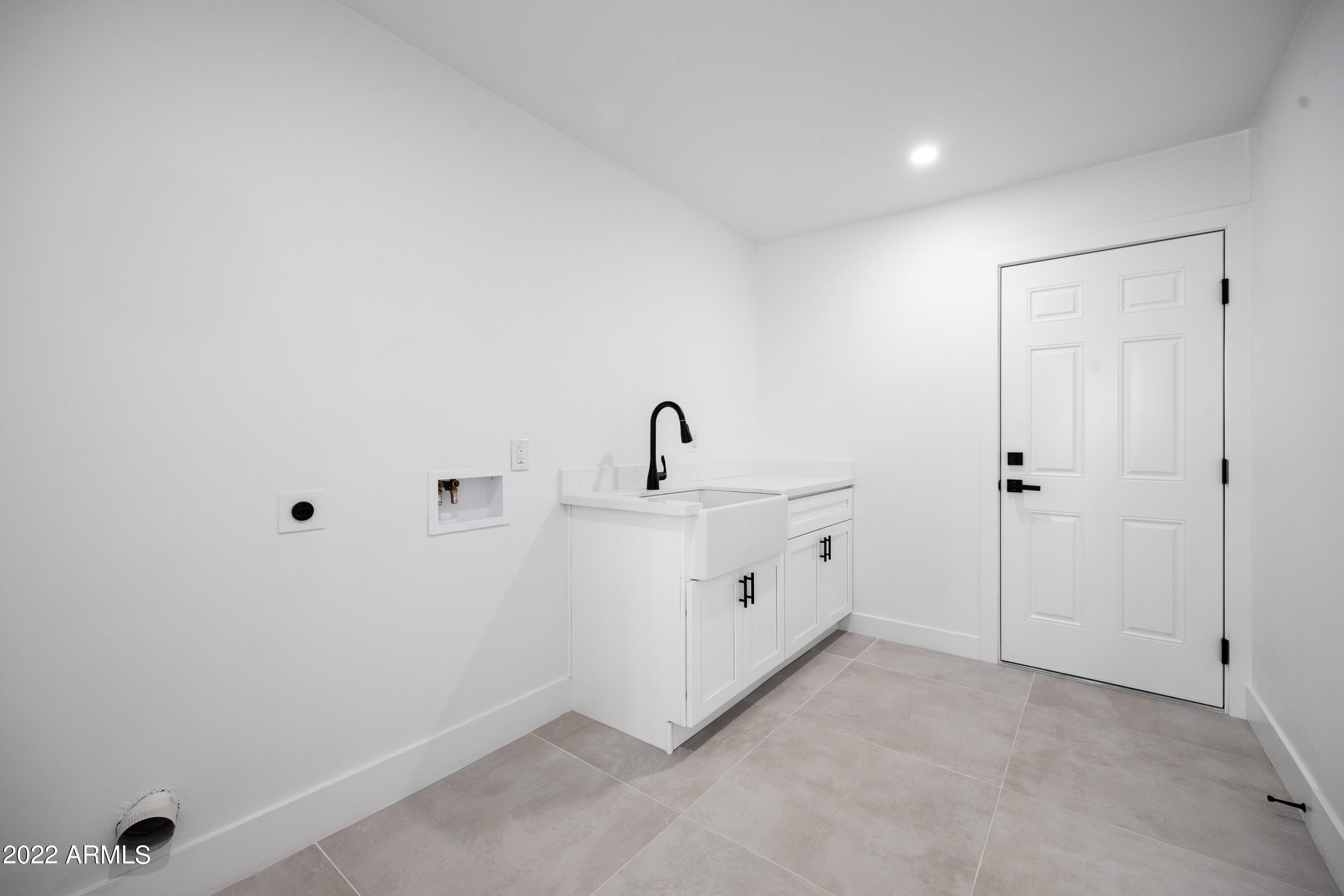 13402 North 58th Place Scottsdale, AZ 85254 - Photo 19 of 24 Laundry Room