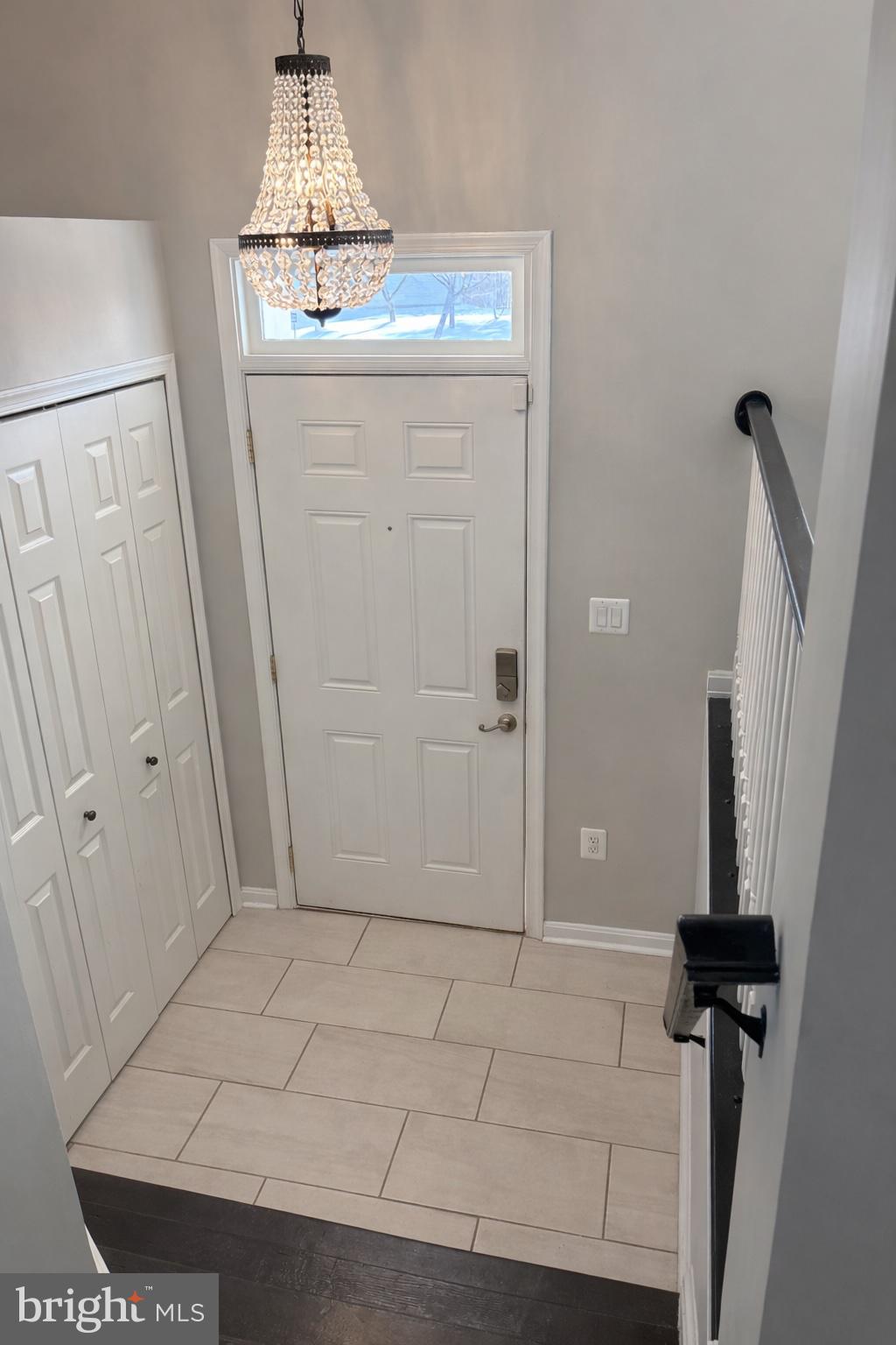 8476 Tackhouse Loop Gainesville, VA 20155 - Photo 3 of 16 a view of front door