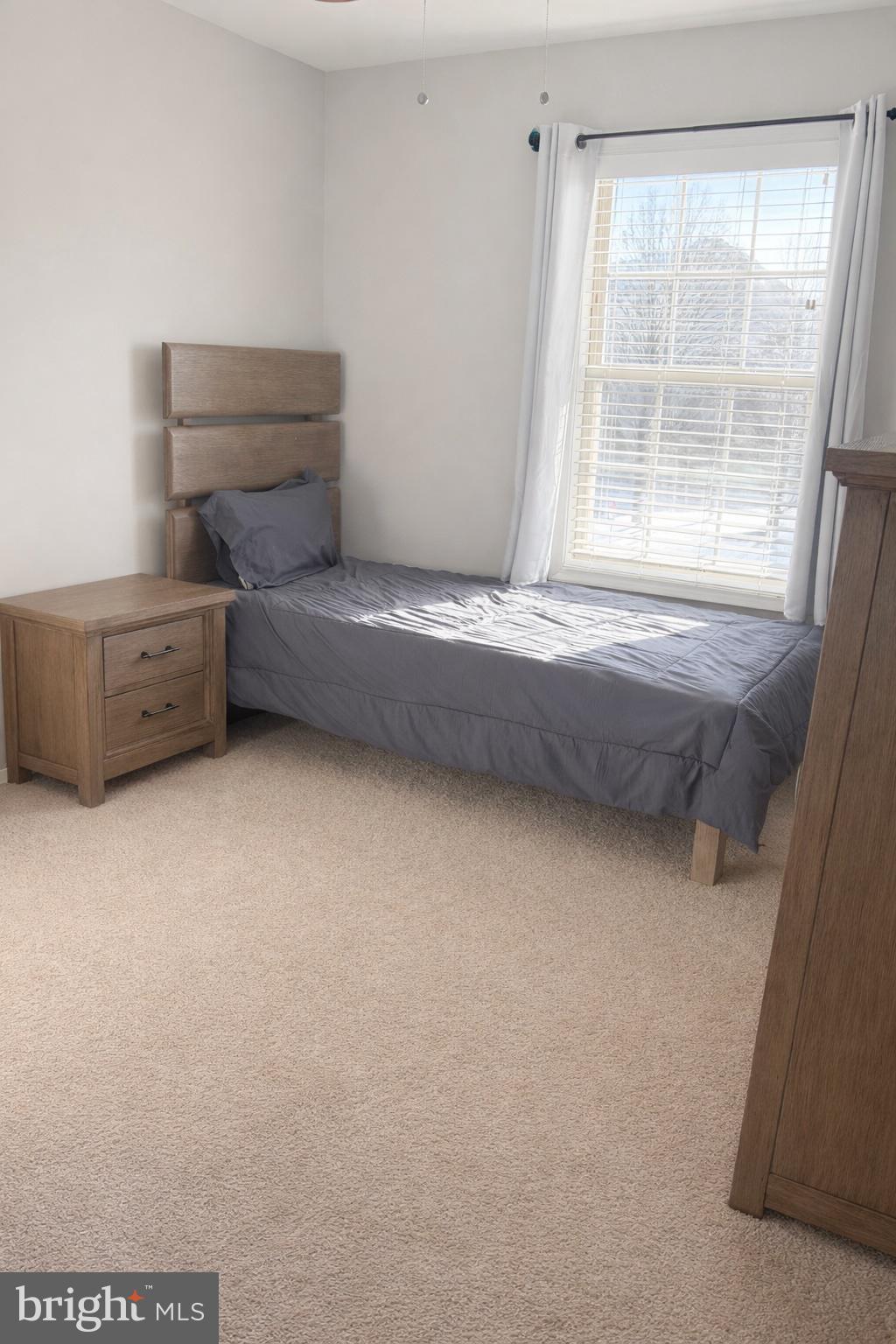 8476 Tackhouse Loop Gainesville, VA 20155 - Photo 10 of 16 a view of room and window