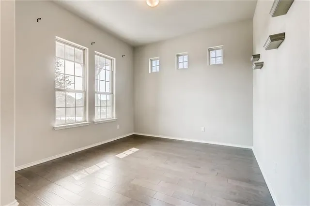 an empty room with windows