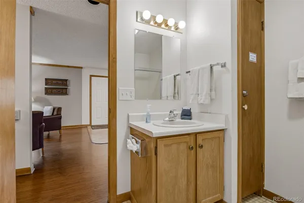 a view of bathroom with dual sinks
