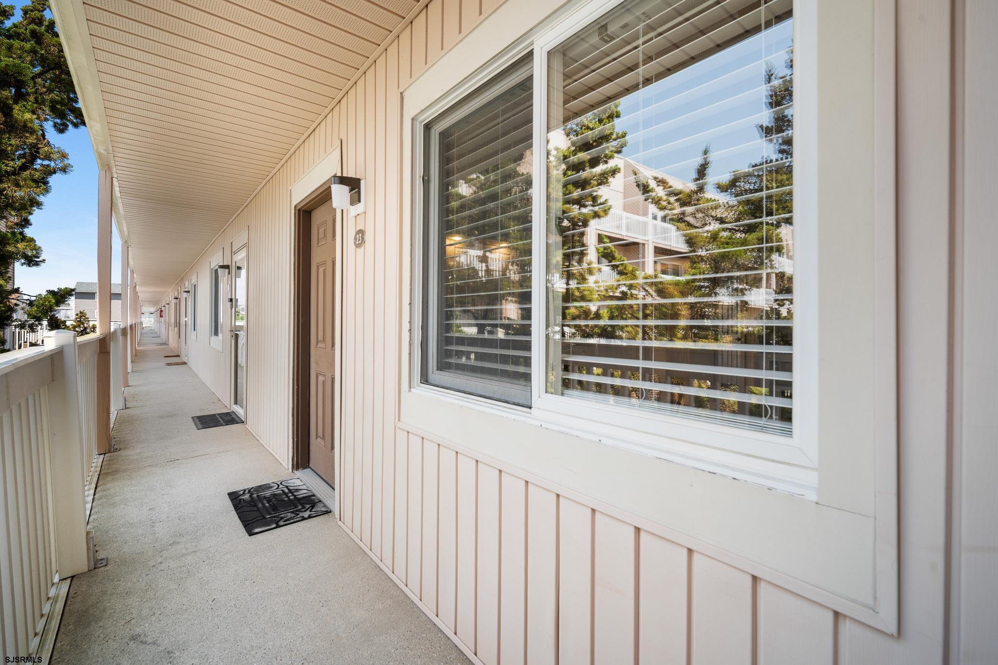 a view of a balcony and a entryway