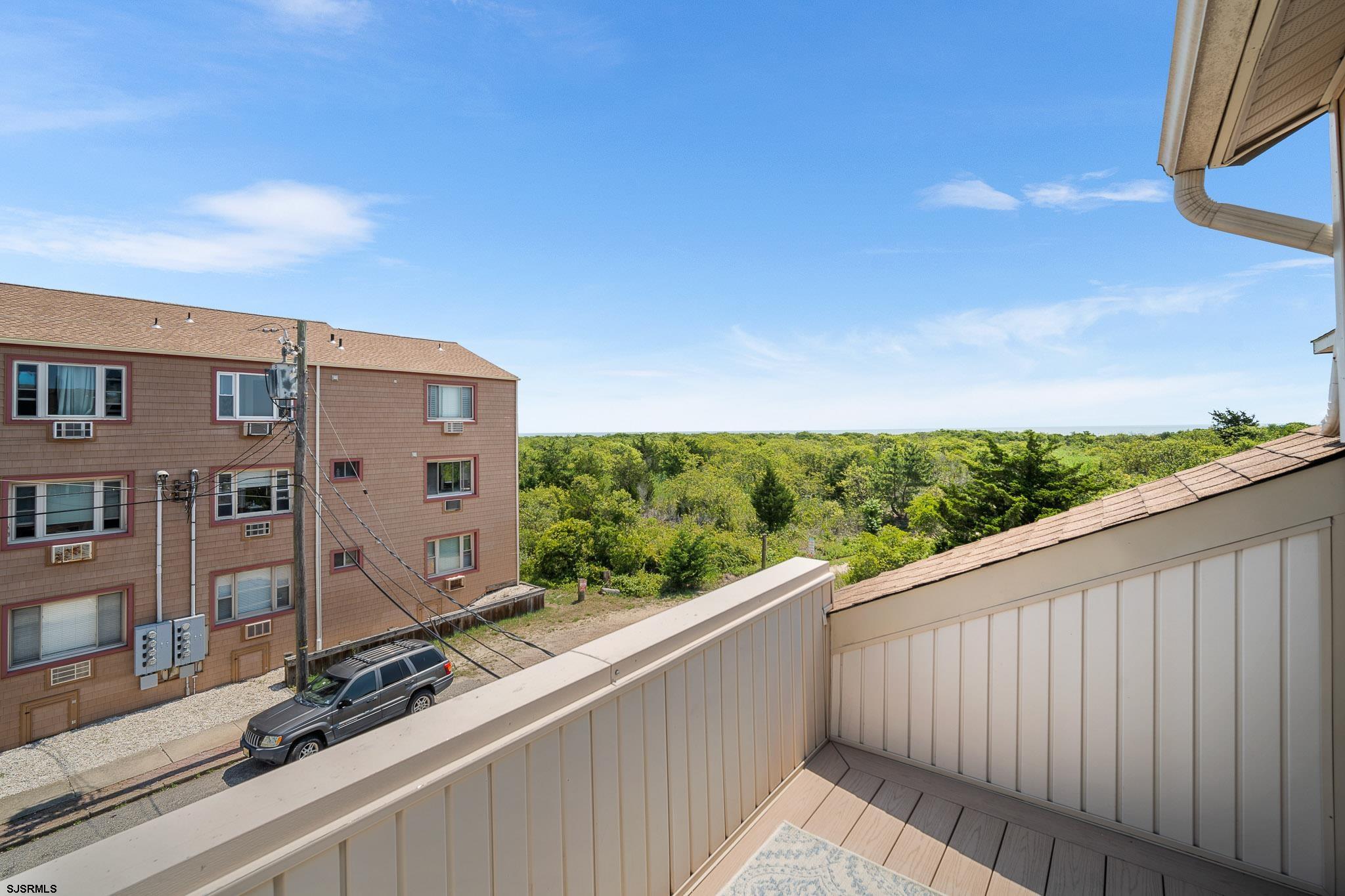 323 44th Street South, Unit 23 Brigantine, NJ 08203 - Photo 23 of 33 a view of a balcony with an outdoor space