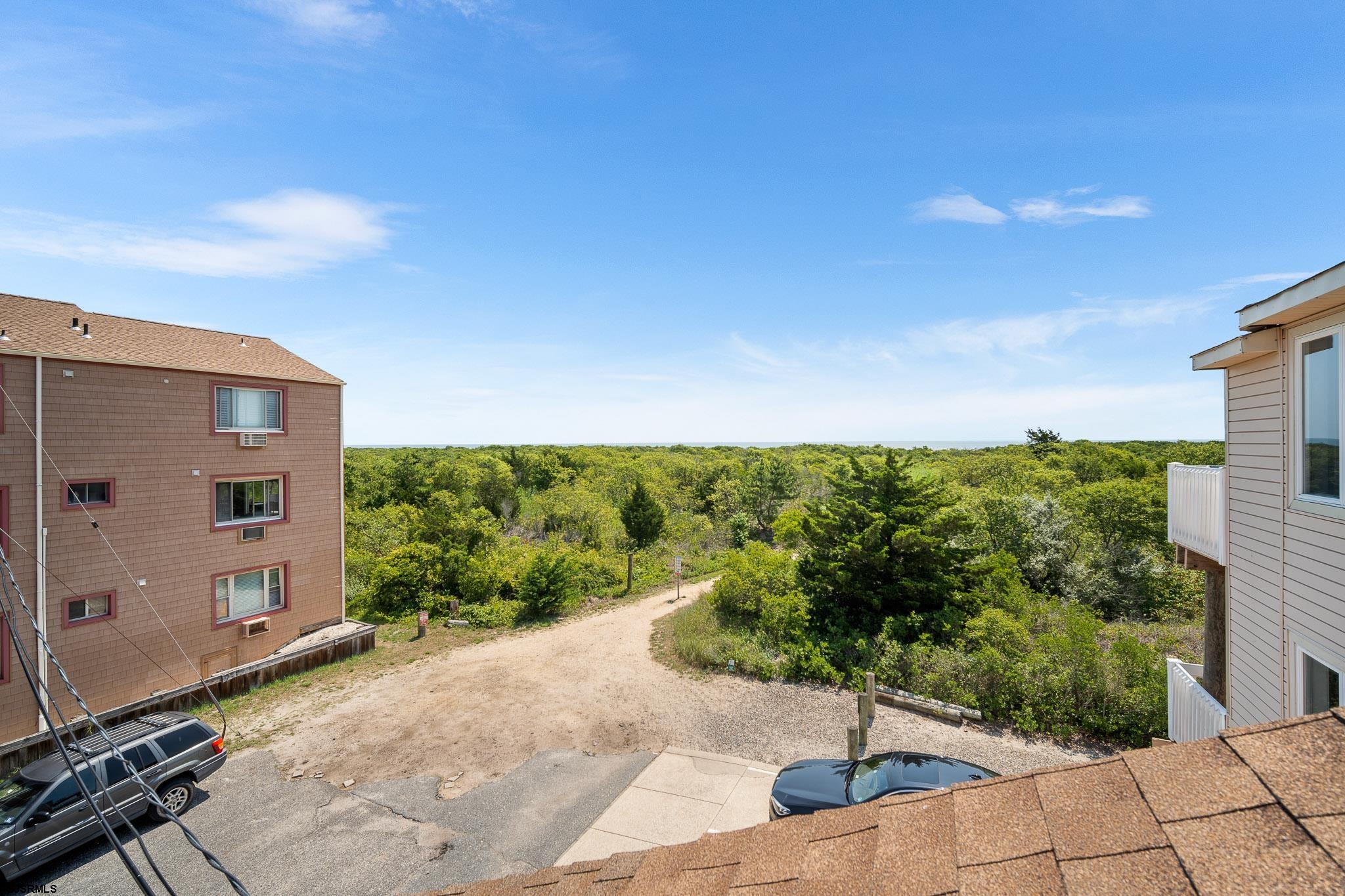 323 44th Street South, Unit 23 Brigantine, NJ 08203 - Photo 25 of 33 a view of a back yard from a balcony