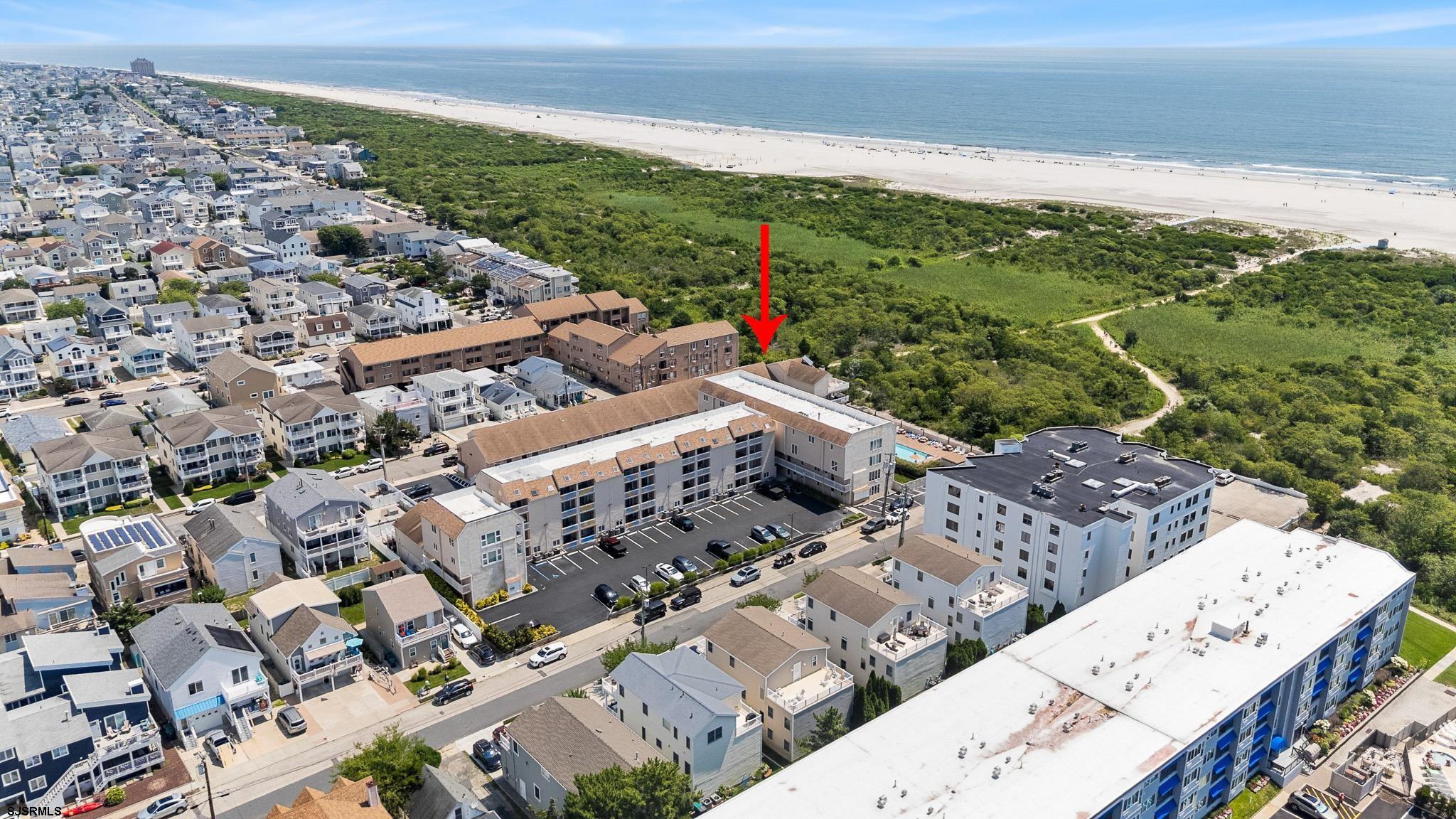 323 44th Street South, Unit 23 Brigantine, NJ 08203 - Photo 26 of 33 a view of an outdoor space with mountain view