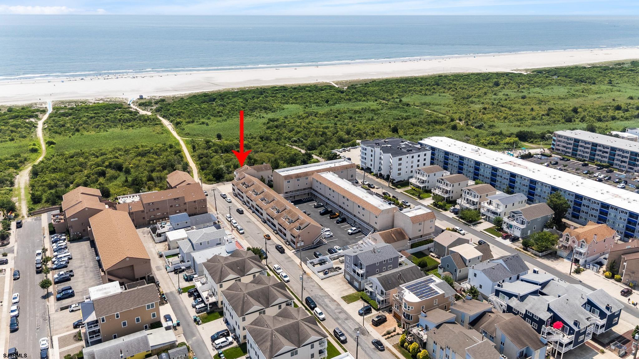 323 44th Street South, Unit 23 Brigantine, NJ 08203 - Photo 29 of 33 a view of balcony with furniture and garden