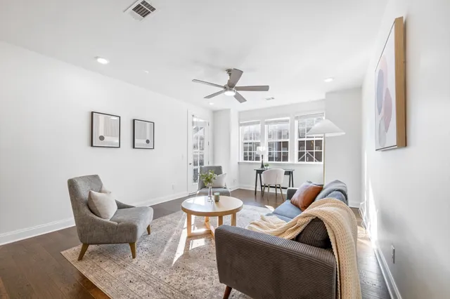 a living room with furniture and window