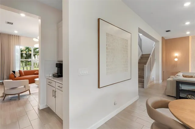 a living room with furniture and a table