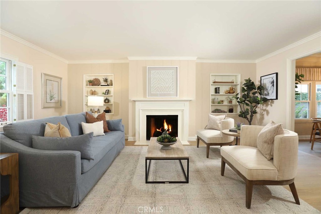 210 Sierra View Road Pasadena, CA 91105 - Photo 18 of 65 a living room with furniture and a fireplace