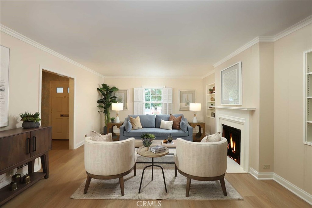 210 Sierra View Road Pasadena, CA 91105 - Photo 19 of 65 a living room with fireplace furniture and a wooden floor