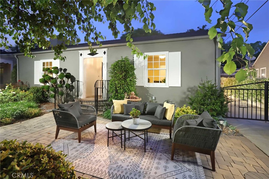 210 Sierra View Road Pasadena, CA 91105 - Photo 2 of 65 a view of a chairs and table in a patio
