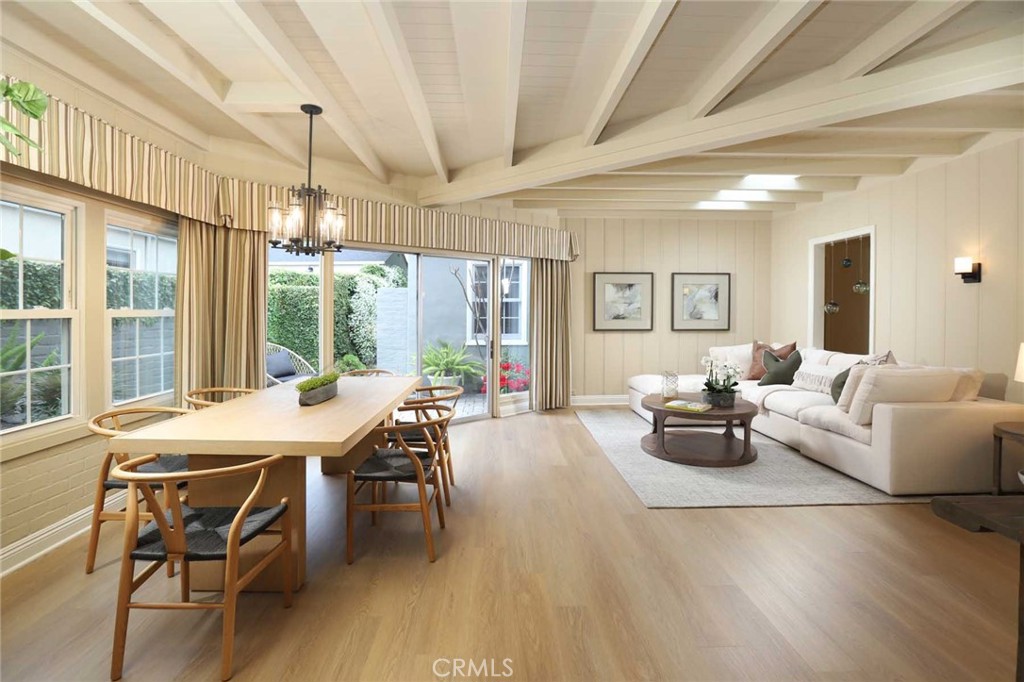 210 Sierra View Road Pasadena, CA 91105 - Photo 21 of 65 a living room with furniture and a large window