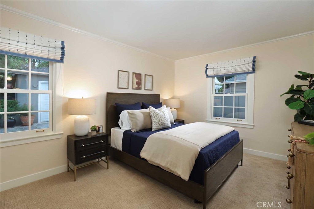 210 Sierra View Road Pasadena, CA 91105 - Photo 32 of 65 a bedroom with a bed and a window