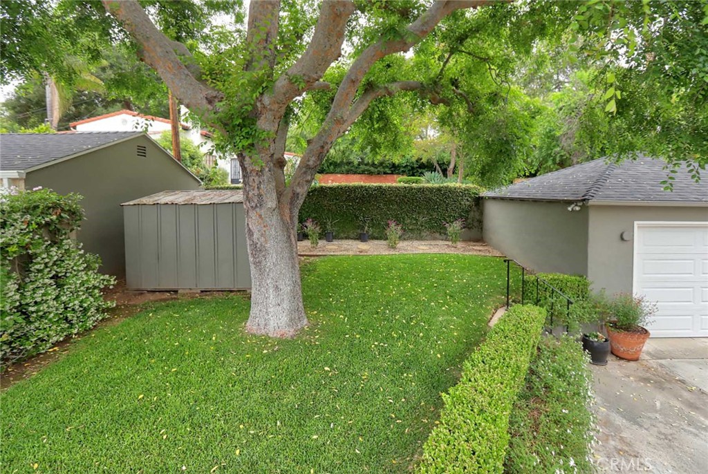 210 Sierra View Road Pasadena, CA 91105 - Photo 53 of 65 a view of a backyard with a garden