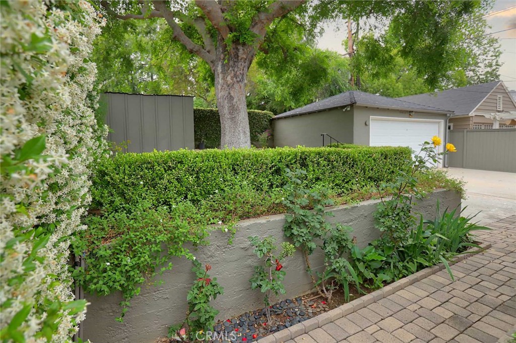 210 Sierra View Road Pasadena, CA 91105 - Photo 61 of 65 front view of a house with a yard