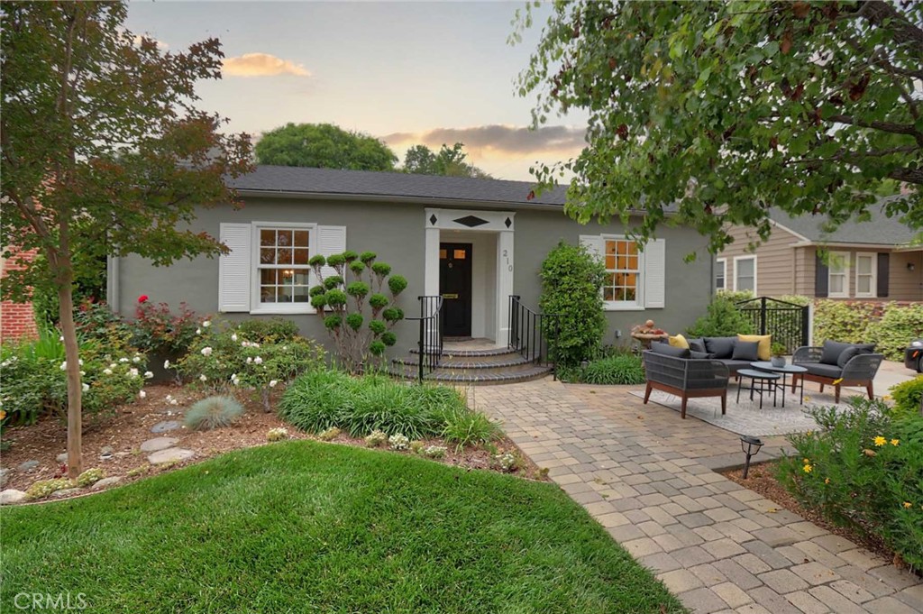210 Sierra View Road Pasadena, CA 91105 - Photo 10 of 65 a view of a house with backyard sitting area and garden