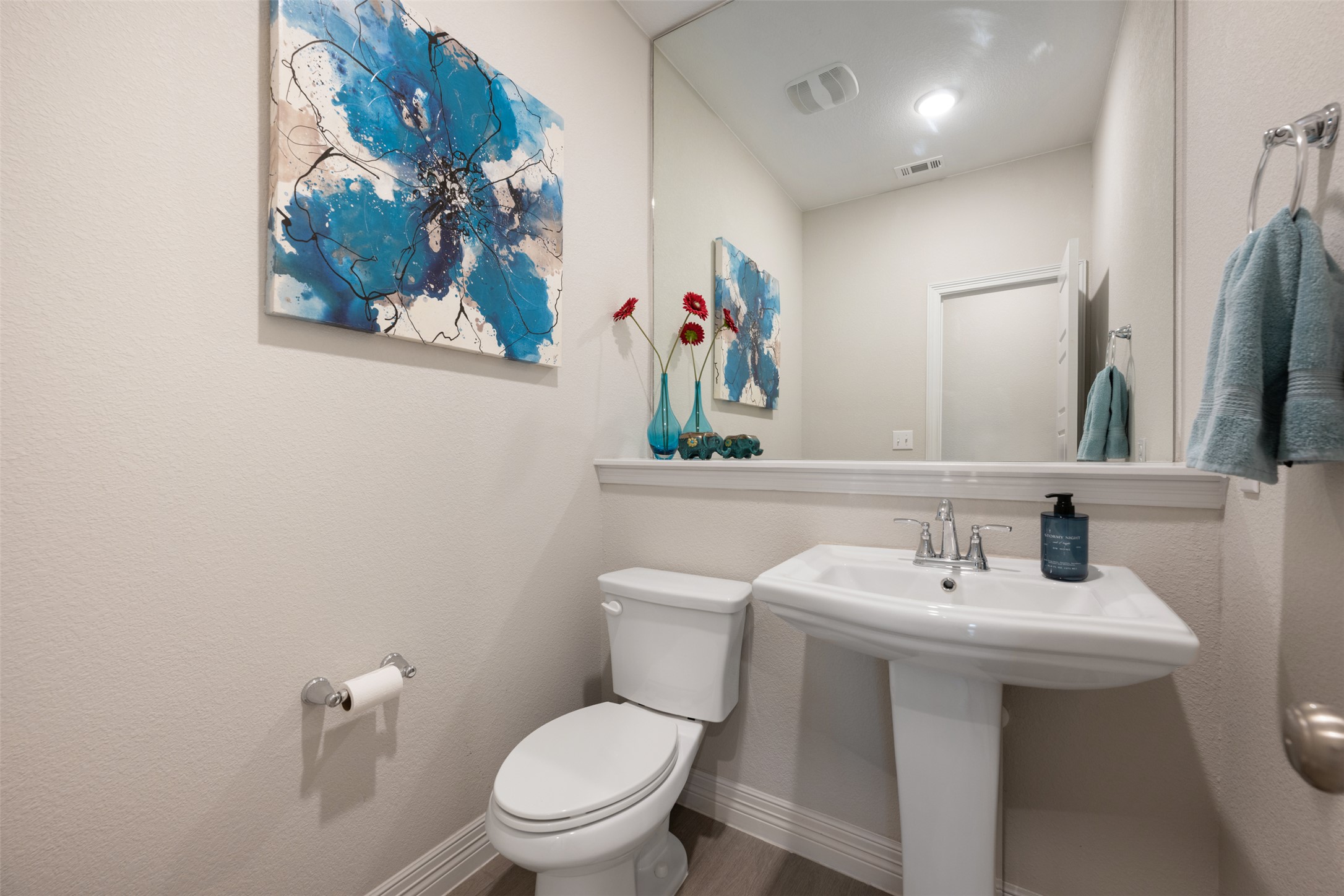 2501 Costera Street Leander, TX 78641 - Photo 25 of 40 Half bathroom downstairs