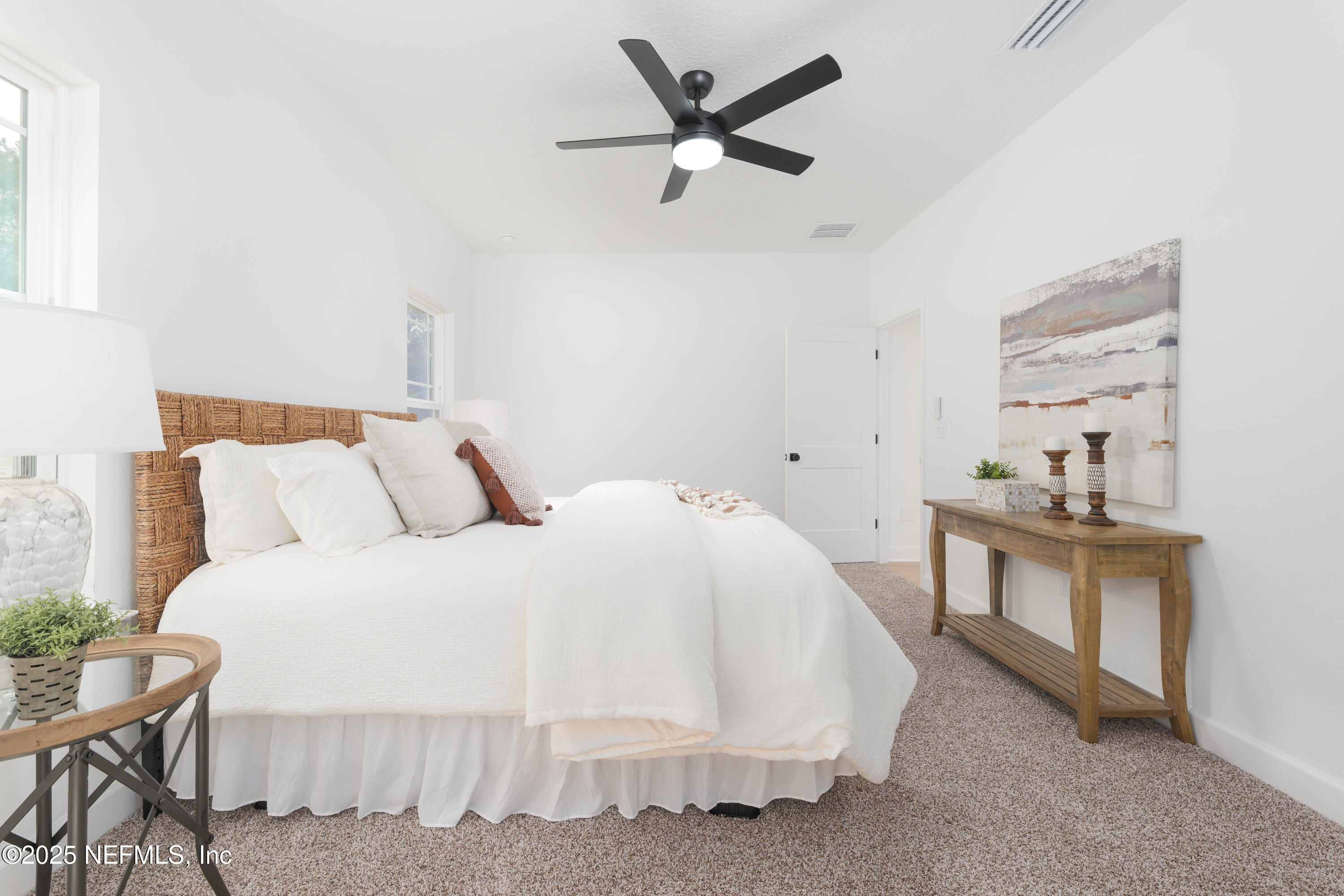 5729 Chippewa Avenue Keystone Heights, FL 32656 - Photo 12 of 20 a bed room with bed and a chair