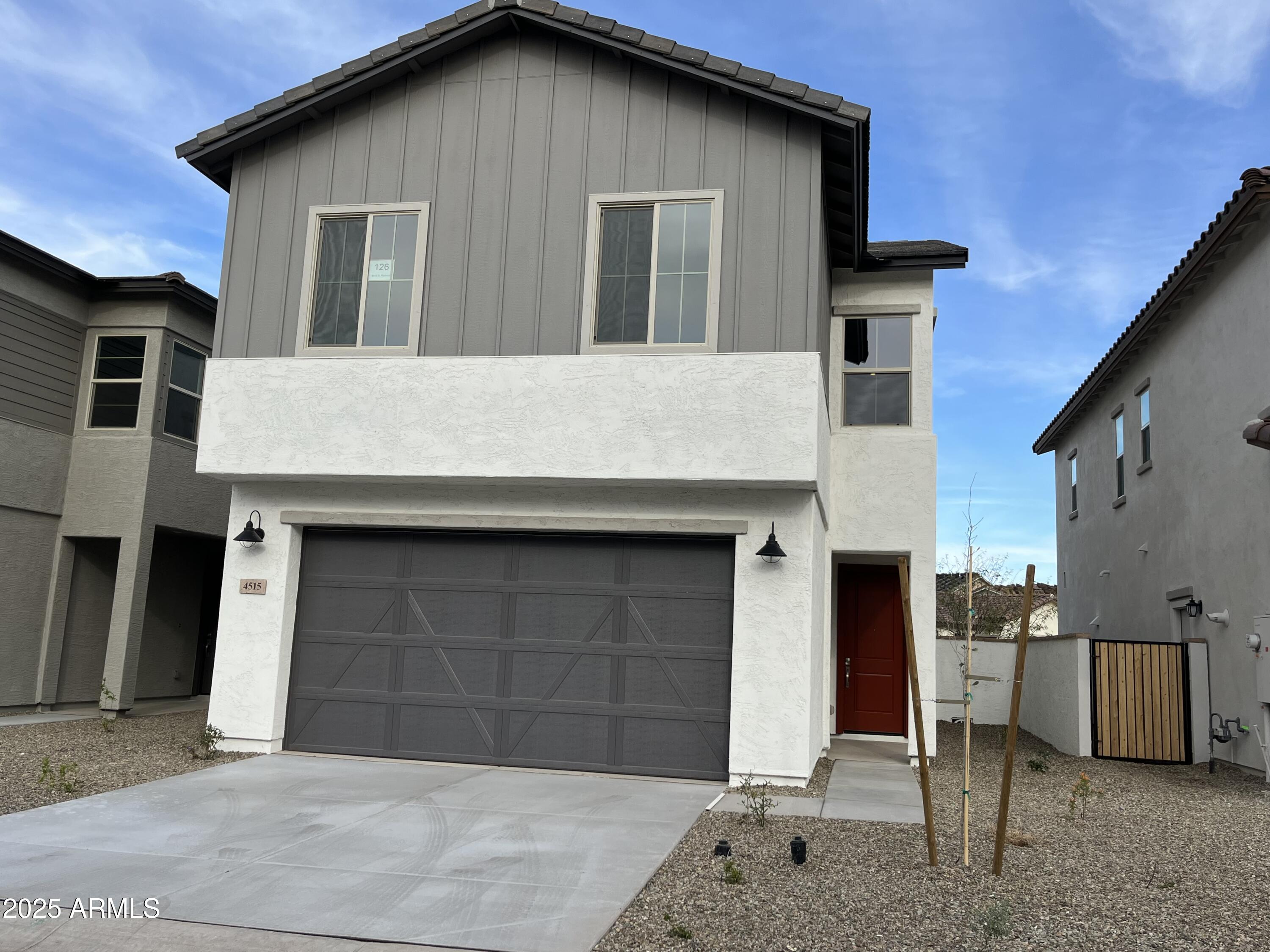 4515 South Pasteur Mesa, AZ 85212 - Photo 1 of 12 a front view of a house with garden