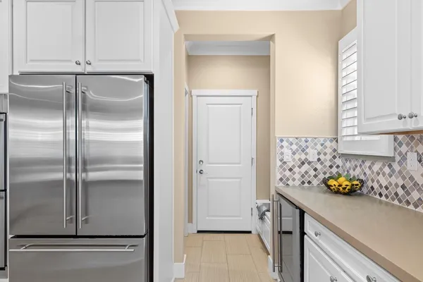 a bathroom with a toilet a sink and a mirror