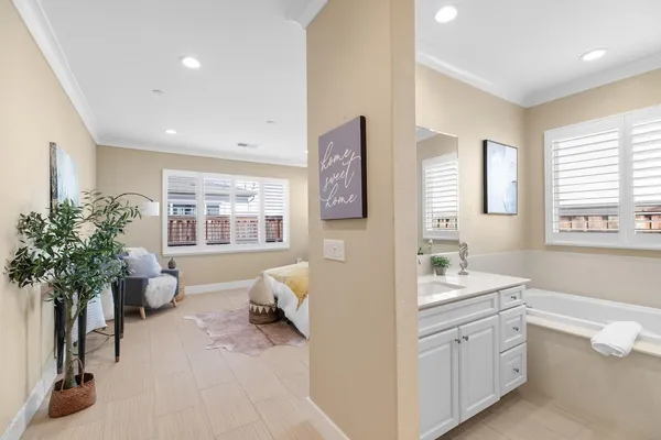 a view of a dining room with furniture and window