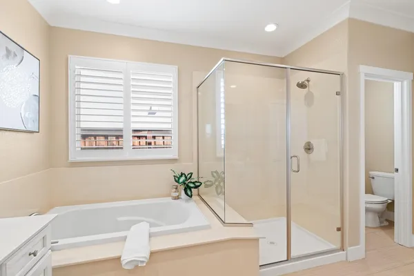 a view of a swimming pool with a patio and a garden