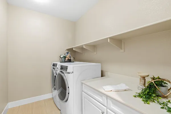 an aerial view of a house with outdoor space tennis court