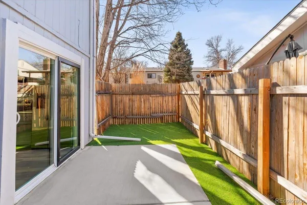 a view of backyard with green space