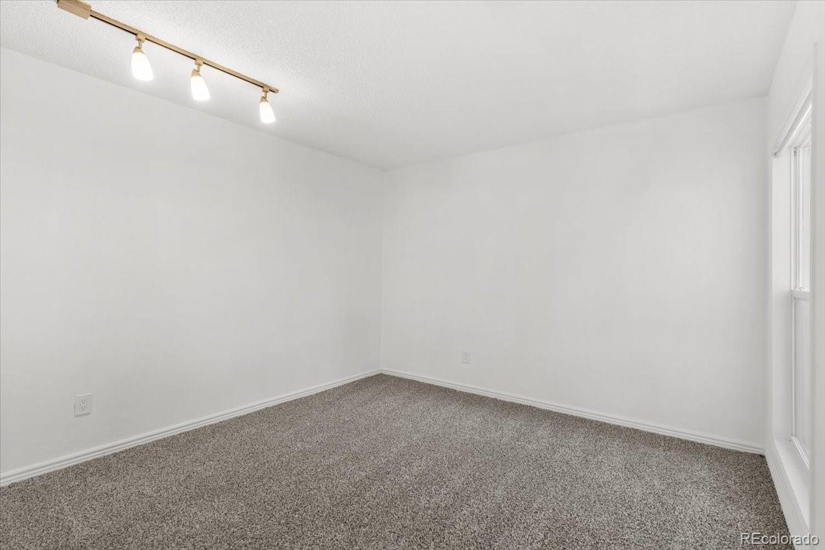 16222 East Rice Place, Unit B Aurora, CO 80015 - Photo 15 of 31 a view of an empty room
