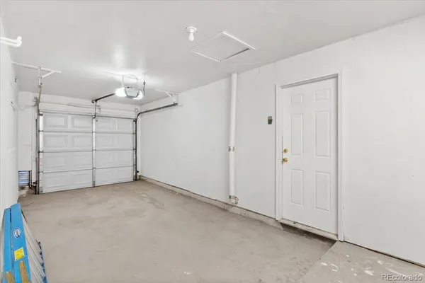 an empty room with a bathroom