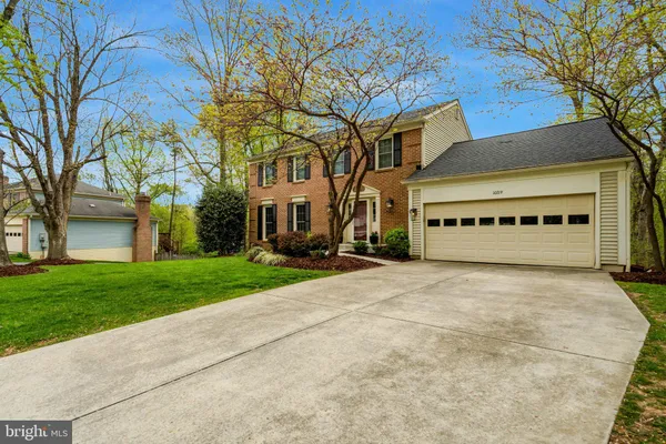 a view of a building with a yard