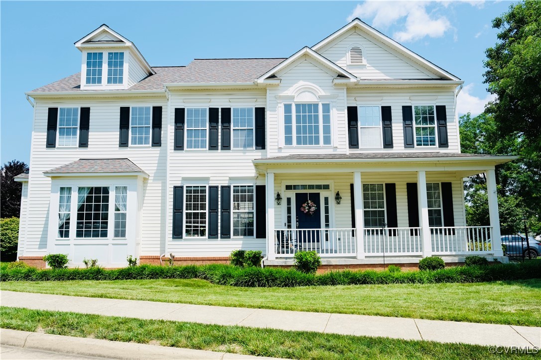front view of a house with a yard
