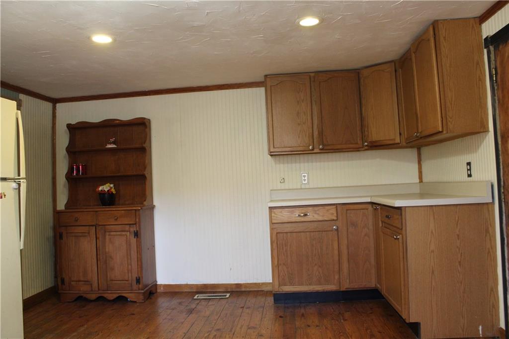 283 Duck Hollow Road Uniontown, PA 15401 - Photo 18 of 38 a kitchen with a sink and cabinets