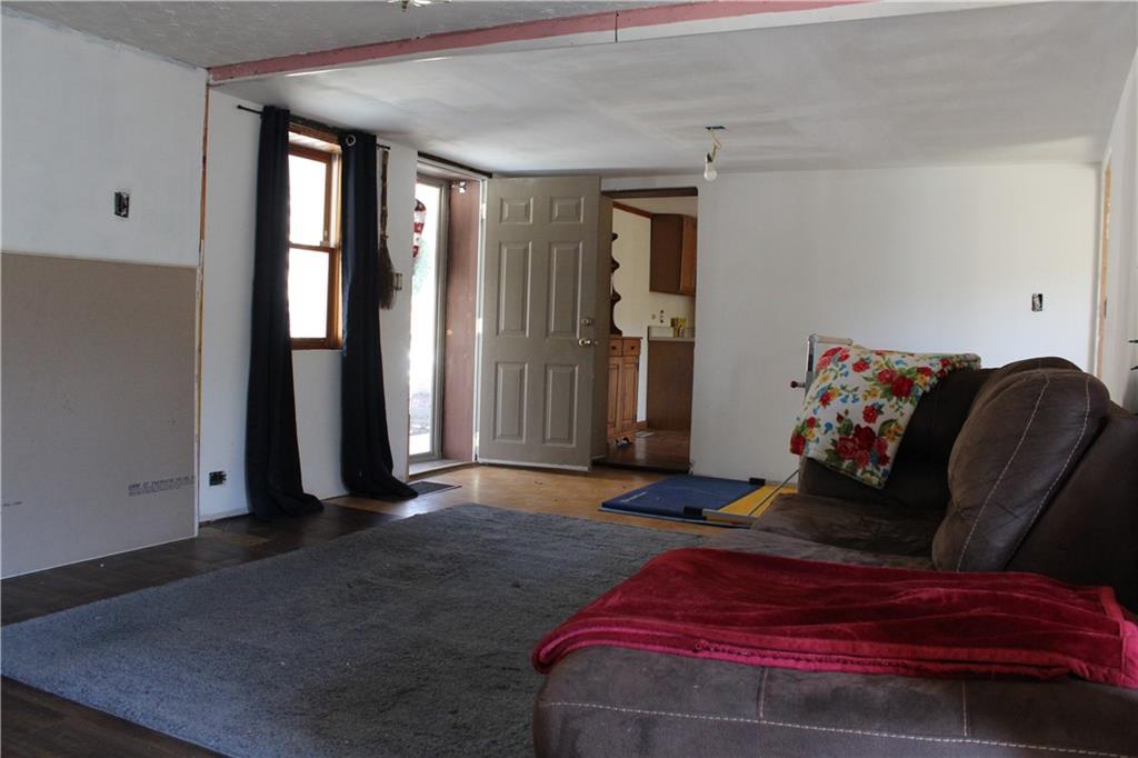 283 Duck Hollow Road Uniontown, PA 15401 - Photo 21 of 38 a spacious bedroom with a bed and window