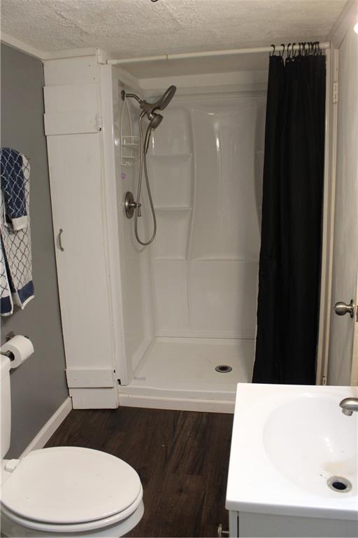 283 Duck Hollow Road Uniontown, PA 15401 - Photo 24 of 38 a bathroom with a sink a toilet and shower
