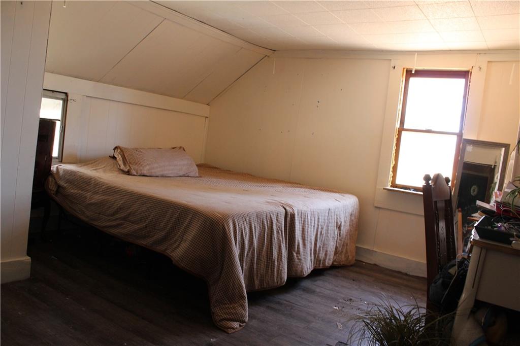 283 Duck Hollow Road Uniontown, PA 15401 - Photo 28 of 38 a bedroom with a bed flat screen tv and a window