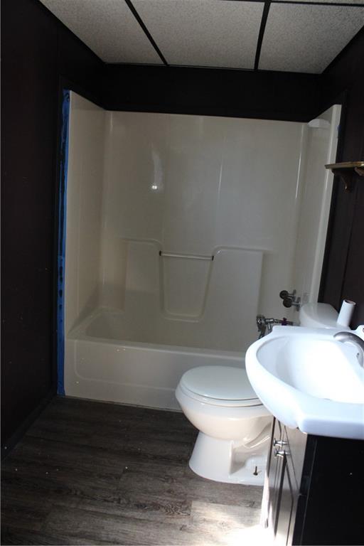 283 Duck Hollow Road Uniontown, PA 15401 - Photo 36 of 38 a bathroom with a sink a toilet a mirror and bathtub