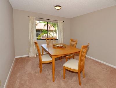 5530 Coach House Circle, Unit E Boca Raton, FL 33486 - Photo 12 of 19 Dining Room