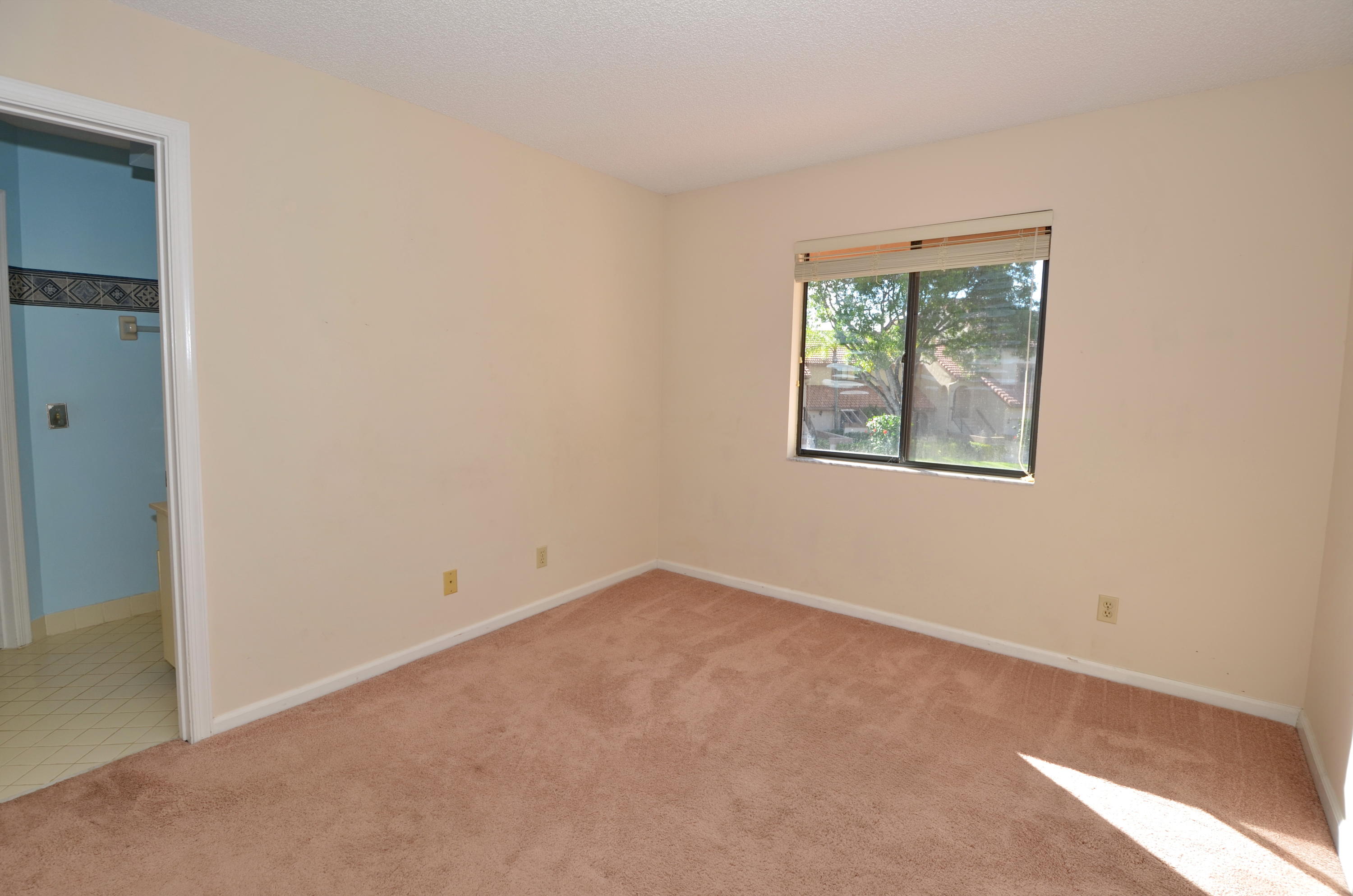 5530 Coach House Circle, Unit E Boca Raton, FL 33486 - Photo 17 of 19 Guest Bedroom