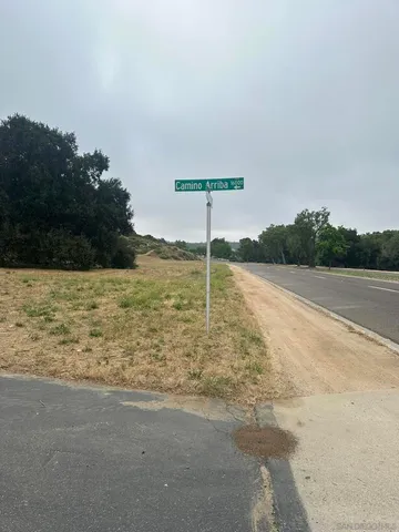 a brick building with a yard
