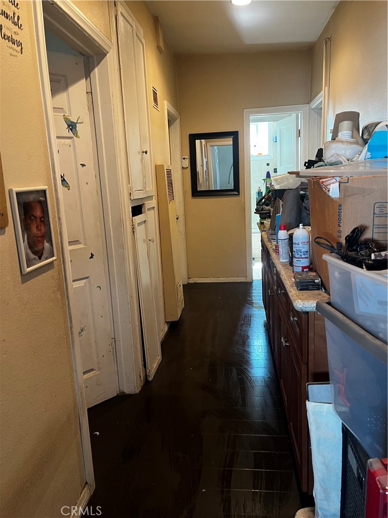 1609 West 166th Street Compton, CA 90220 - Photo 3 of 19 WIDE HALLWAY WITH A CABINET WITH PLENTY OF DRAWERS (SORRY PACKING)