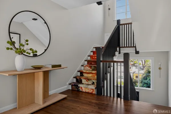 a view of entryway with wooden floor