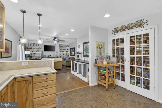 a view of front door with outdoor seating